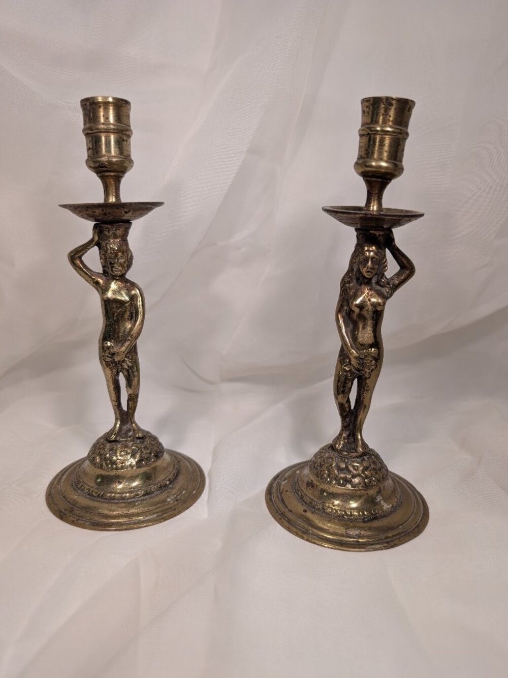 PAIR OF VICTORIAN ADAM AND EVE BRASS CANLESTICKS  FOUND IN STIRLING , SCOTLAND